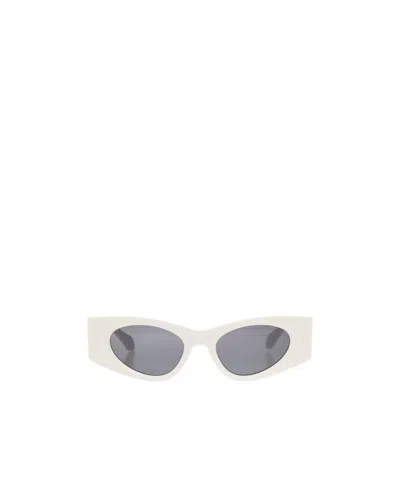Alaïa Logo Sunglasses In Gray