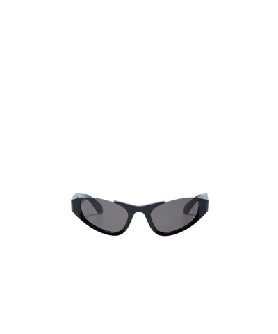 Alaïa Logo Sunglasses In Gray
