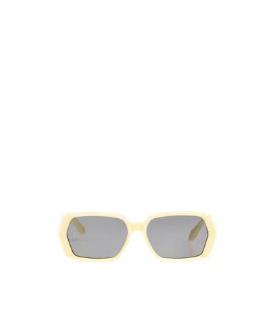 Alaïa Logo Sunglasses In Gray
