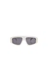 Alaïa Logo Sunglasses In Gray