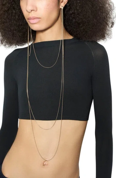 ALAÏA ALAÏA LONG SLEEVE CROP TOP