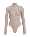 Alaïa Long-sleeved Jumpsuit In Nude