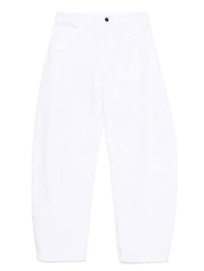 Alaïa Low Round Denim Jeans In White