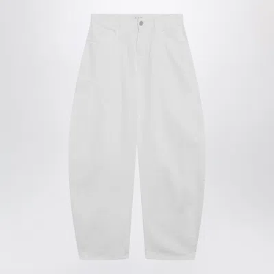 ALAÏA ALAÏA LOW-RISE ROUNDED JEANS IN WHITE DENIM