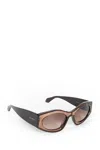 Alaïa Man  Eyewear In Black