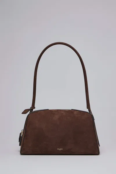 Alaïa Le Bouledogue Bowling Shoulder Bag In Nubuck Leather In Brown