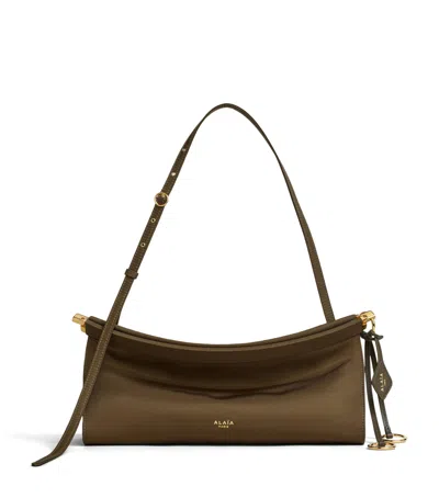 Alaïa Medium Le Click East West Shoulder Bag In Green