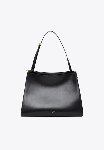 Alaïa Medium Le Click Leather Shoulder Bag In Black