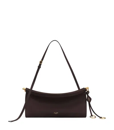 Alaïa Medium Leather Le Click East West Shoulder Bag