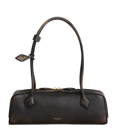 Alaïa Medium Leather Le Teckel Shoulder Bag In Black