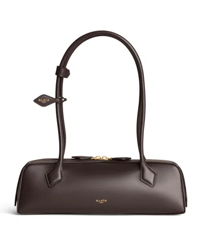 Alaïa Medium Leather Le Teckel Shoulder Bag In Brown