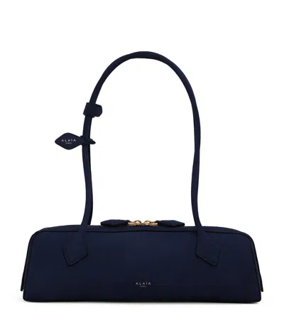 Alaïa Medium Nubuck Le Teckel Shoulder Bag In Blue