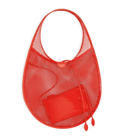 Alaïa Medium One Piece Shoulder Bag In Orange