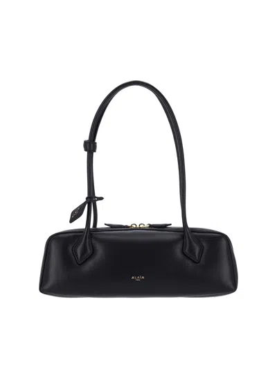 Alaïa Medium Shoulder Bag "le Teckel" In Black