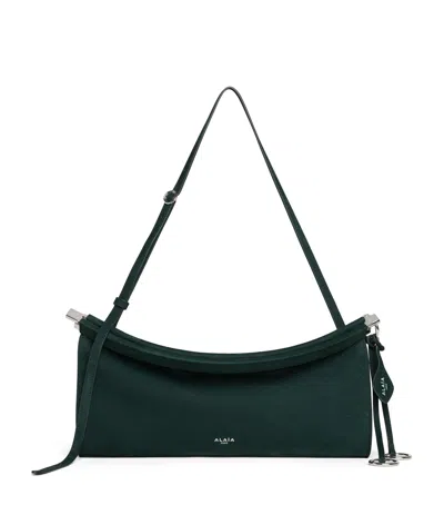 Alaïa Medium Suede Le Click East West Shoulder Bag In Green