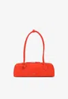 Alaïa Le Teckel Medium Nubuck Shoulder Bag In Orange