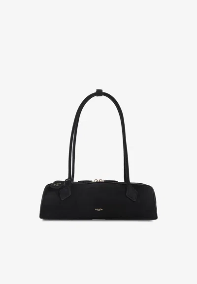 Alaïa Medium Teckel Shoulder Bag In Black