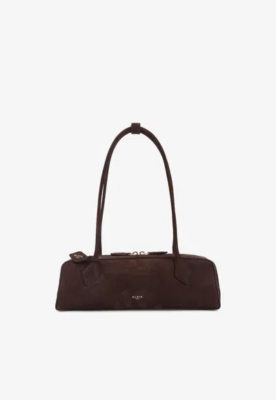 Alaïa Medium Teckel Shoulder Bag In Brown