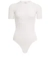 Alaïa Wool-blend Bodysuit In Blanc Naturel