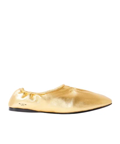 Alaïa Metallic Leather Ballet Flats In Gold