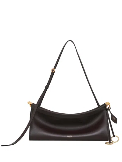 Alaïa Logo Stamp Small East West Shoulder Bag In Black