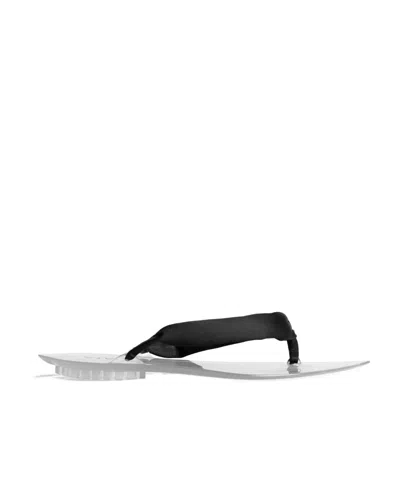 Alaïa Mules Tong Invisible En Satin In Multi