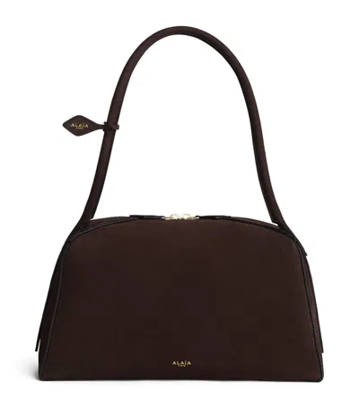 Alaïa Nubuck Leather Le Bouledogue Shoulder Bag In Brown