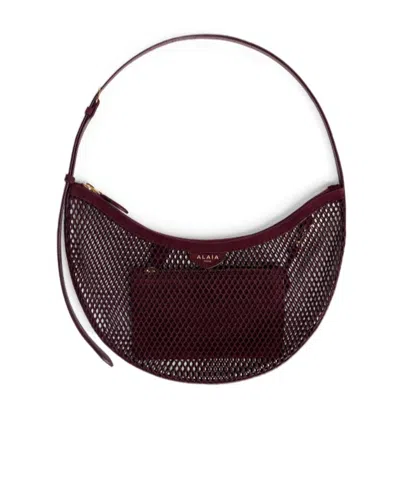 Alaïa One Piece Demi Lune Bag In Fishnet And Suede In Red