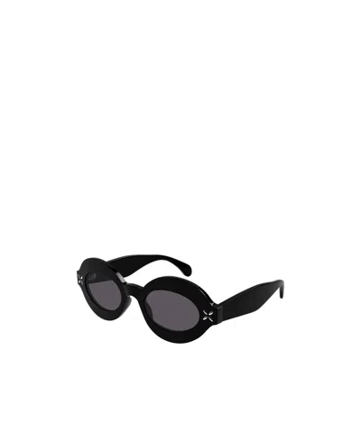 Alaïa Oval-frame Sunglasses In Black