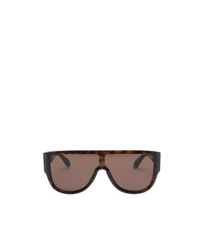 Alaïa Oversized Sunglasses In Brown