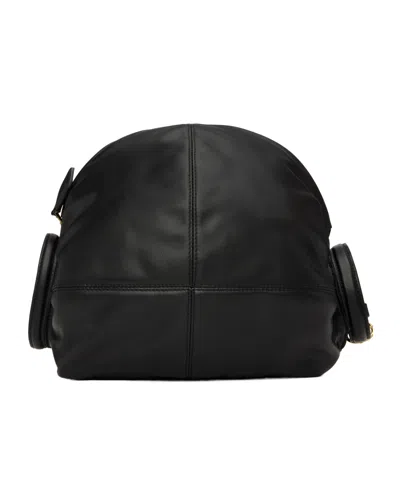 Alaïa Paneled Polished Leather Clutch In Black