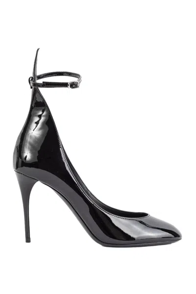ALAÏA PATENT LEATHER PUMPS