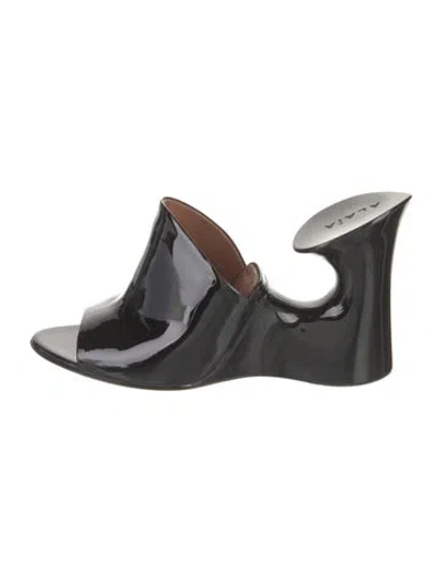 Pre-owned Alaïa Patent Leather Slides In Black