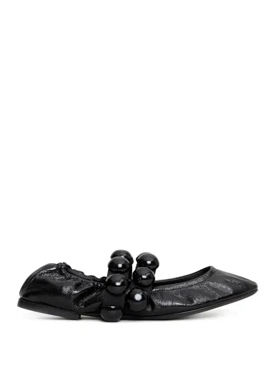 ALAÏA PATENT LEATHER SPHERE BALLET FLATS