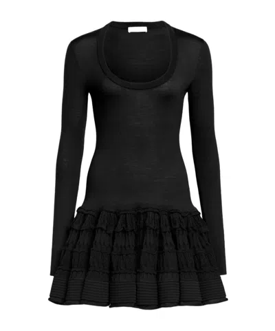 Alaïa Peplum Dress In Wool Crinoline In Knit In Black