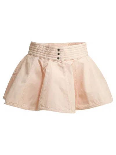 Alaïa Peplum Mini Skirt In Dyed Denim In Pink