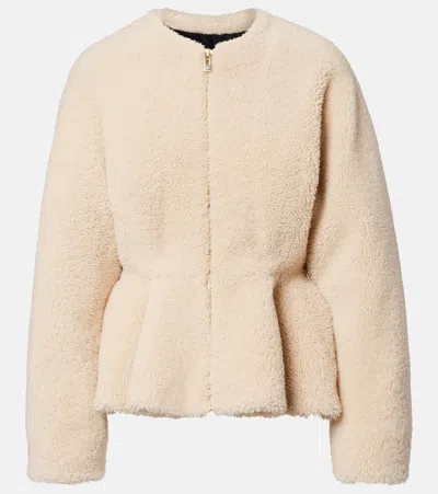 Alaïa Peplum Shearling Jacket In Brown
