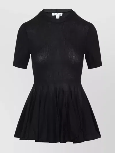 ALAÏA PEPLUM TOP FLARED HEM