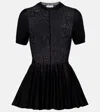 Alaïa Peplum Virgin Wool Top In Black