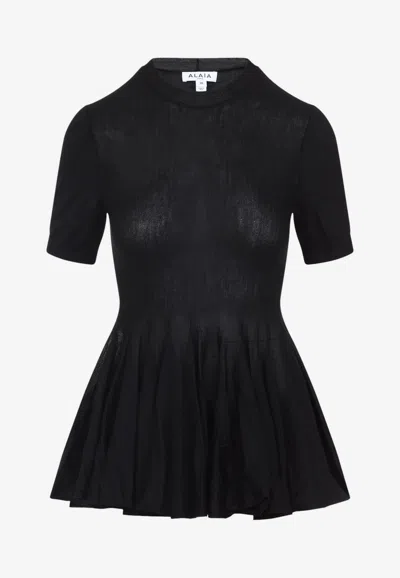 ALAÏA PEPLUM WOOL TOP