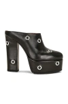 Alaïa Leather Grommet Platform Mules In Noir