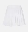 Alaïa Pleated Semi-sheer Miniskirt In Weiss