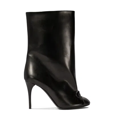 ALAÏA POINTED SHORT BOOTS