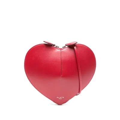 Alaïa Red Satchels & Cross Body Bags Women
