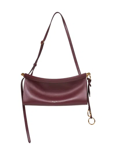 Alaïa Rouge Grenat Le Click East West Small Bag In Burgundy