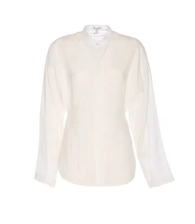 ALAÏA ROUND BLOUSE IN LINEN BLEND