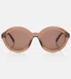 Alaïa Round Sunglasses In Brown