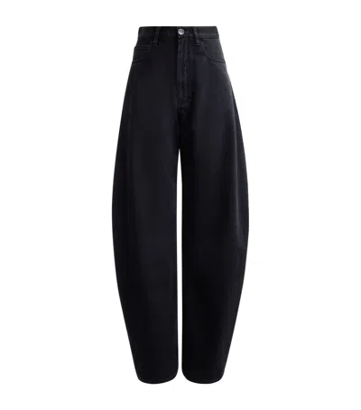 ALAÏA ROUND WIDE-LEG JEANS