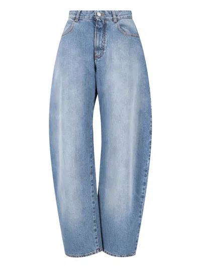 Alaïa Rounded Denim Trousers In Blue