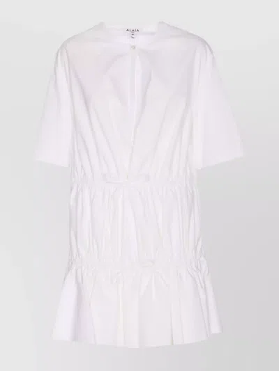 ALAÏA RUFFLE DRESS V-NECK BOW DETAIL
